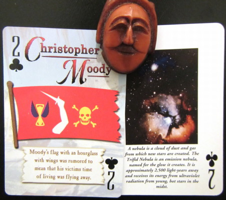 Twos of clubs, one about a pirate whose flag was rumoured to signify that his victims' time of living was flying away, and one of a nebula which receives its energy from young, hot stars in its midst 
